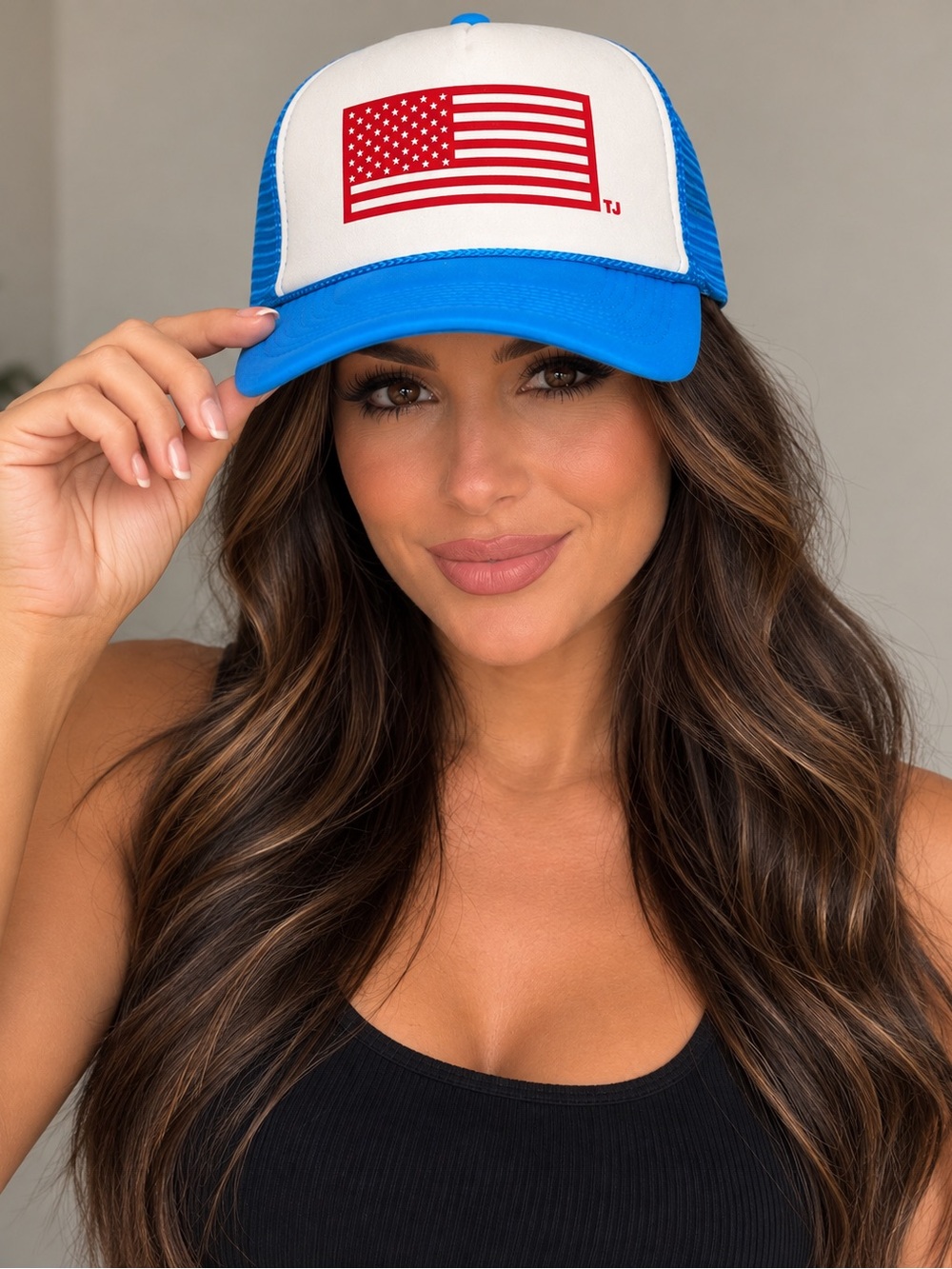 Blue and White Trucker Hat with Red Flag Patch
